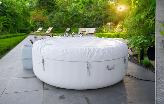 hot tub in garden with trees